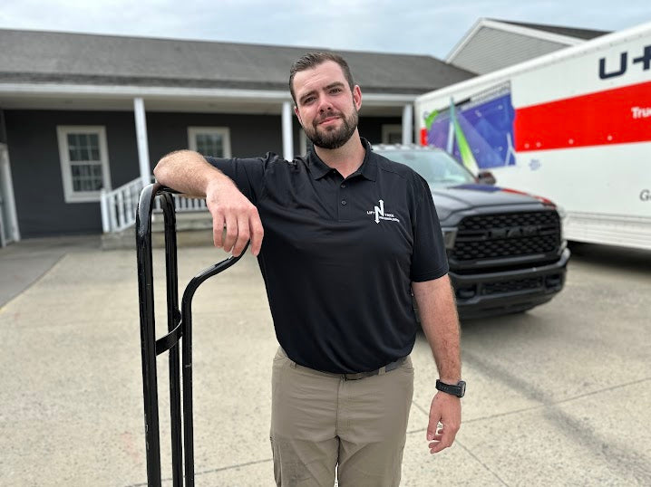 Lift N Take crew loading furniture onto a trailer