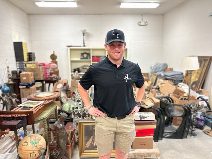 Lift N Take team stacking debris for recycling